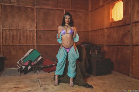 Stunning pornstar Gina Valentina flaunting her glorious ass in a hot strip