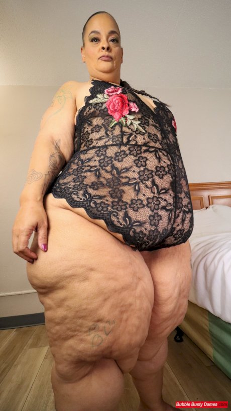 SSBBW Strawberrys Delight shows her massive ass in black lingerie