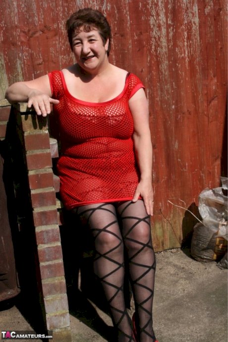 Older UK fatty Kinky Carol takes off her dress outdoors in sexy pantyhose