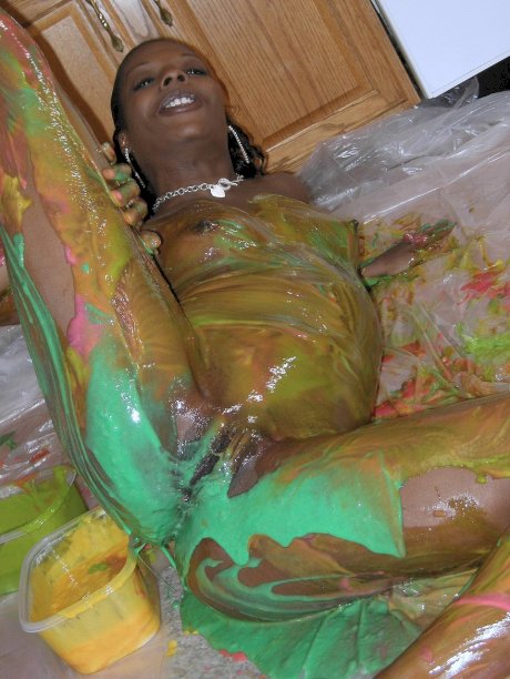 Ebony amateur Anastasia covers her hot body with paint in the kitchen