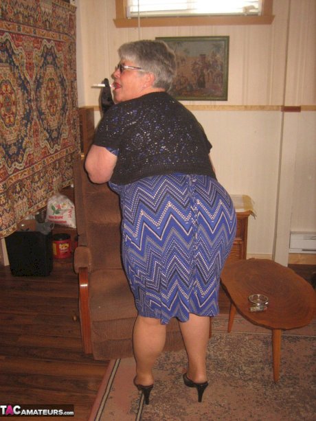 Fat granny Girdle Goddess gets naked in shades, gloves and pantyhose