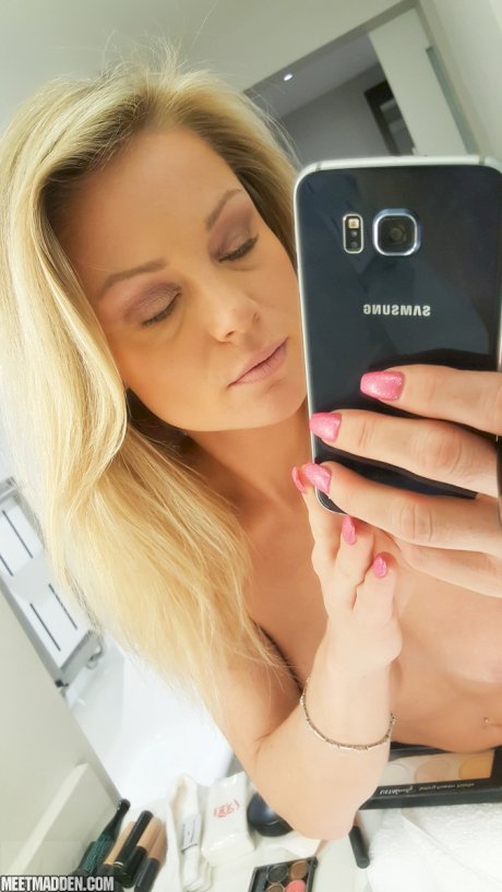 Amateur model takes naked and non naked bathroom selfies in mirror