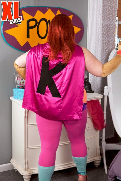 Redheaded fatty Kitty Mcpherson releases her large boobs from cosplay attire