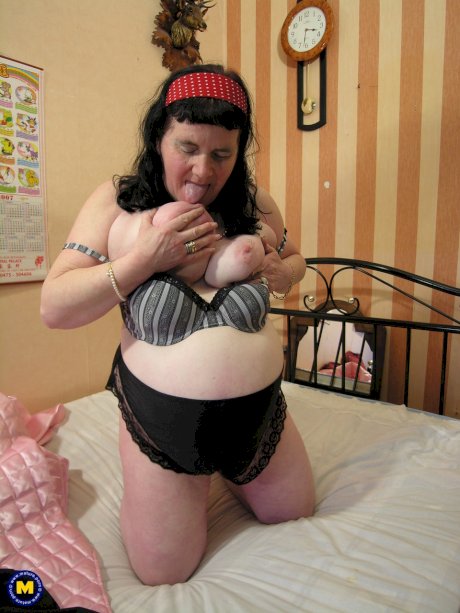 Fat granny Bernadet toys her juicy muff after showing her huge breasts