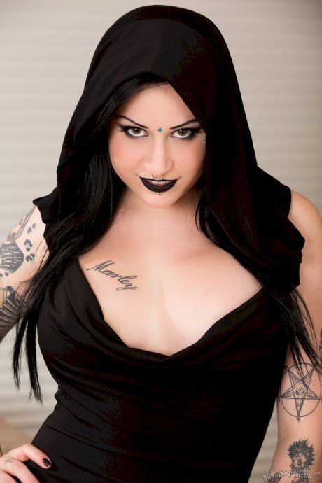 Stunning goth Ophellia Rain sheds hooded dress to expose exquisite big tits