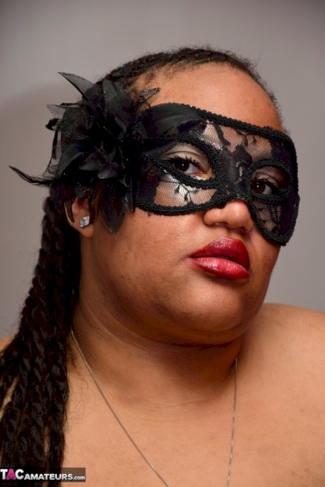 SSBBW wears a mask while unveiling her huge saggy tits and massive ass