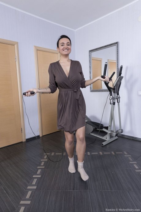 Short-haired amateur Ramira strips after her workout & shows her furry cunt