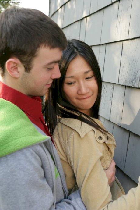 Asian teen Tai Lee Liam and her boyfriend have sex up against siding - Photo 1