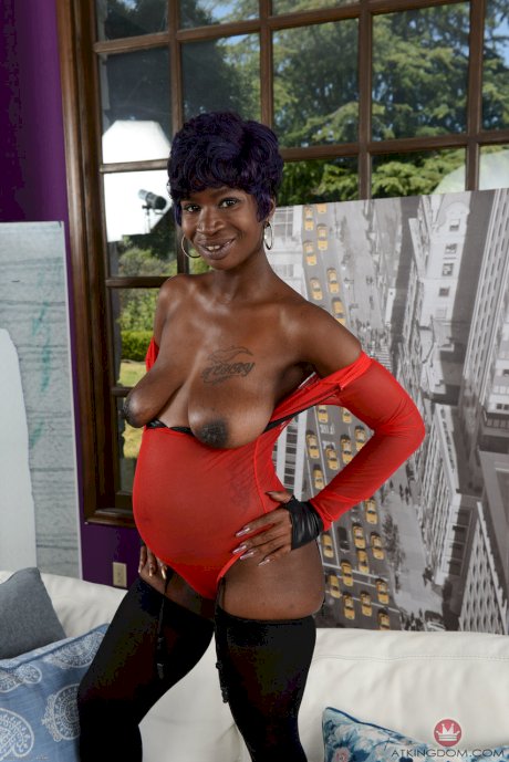 Pregnant ebony in nylons Tiana Grey unveils her hanging tits & her hairy pussy