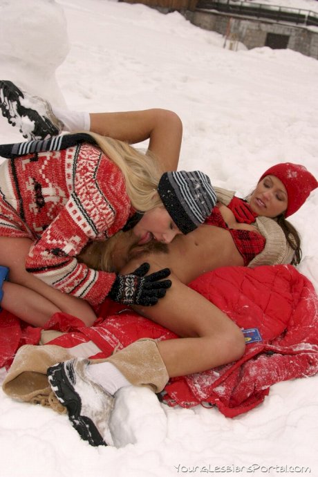 Amateur girls build a snowman before lesbian sex in the snow