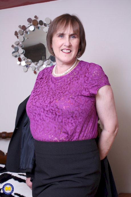 Big-breasted granny Allison strips down to her stockings & toys her hairy cunt