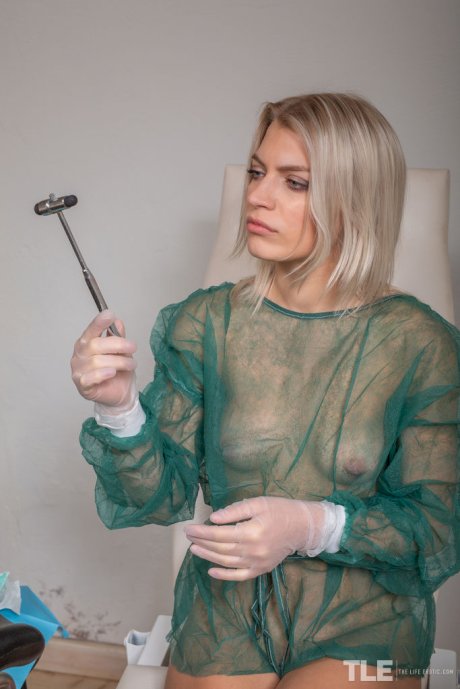 Horny teen Lesya attends to her pussy with dental instruments