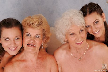 Dirty-minded teenage lesbians perform foursome posing scene with lewd grannies