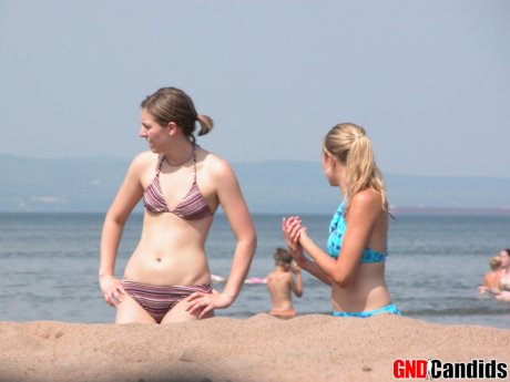 Candid snaps of amateur girls wearing bikinis on public beaches