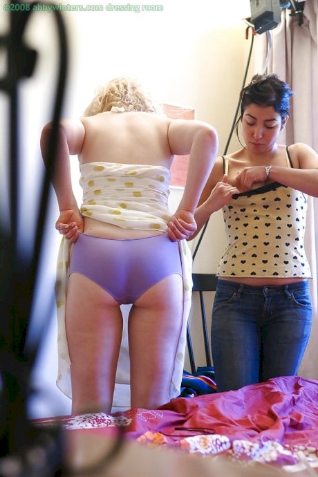 Spy camera catches two lesbians getting dressed after having sex - Photo 15