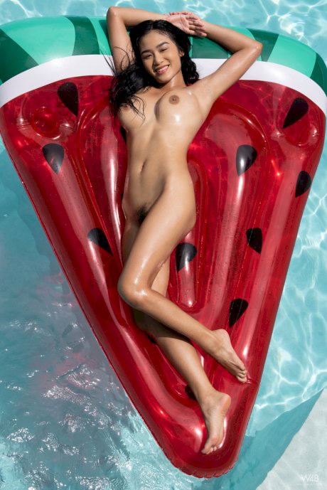 Asian model Kahlisa strips her swimsuit & oils up her incredible body outside