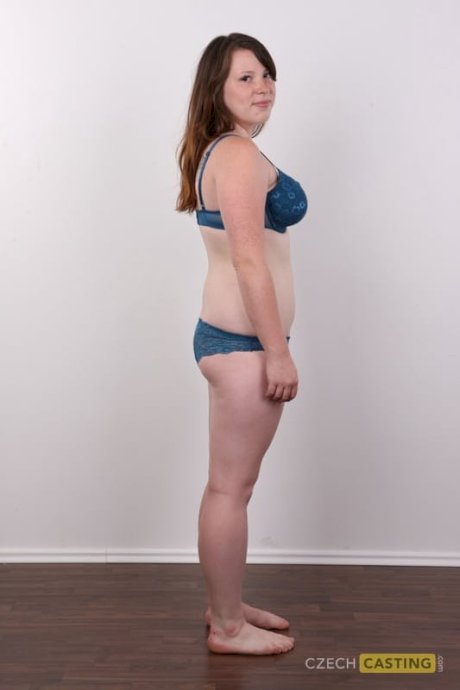Chubby redhead undresses to stand naked and show her big tits and big butt - Photo 8