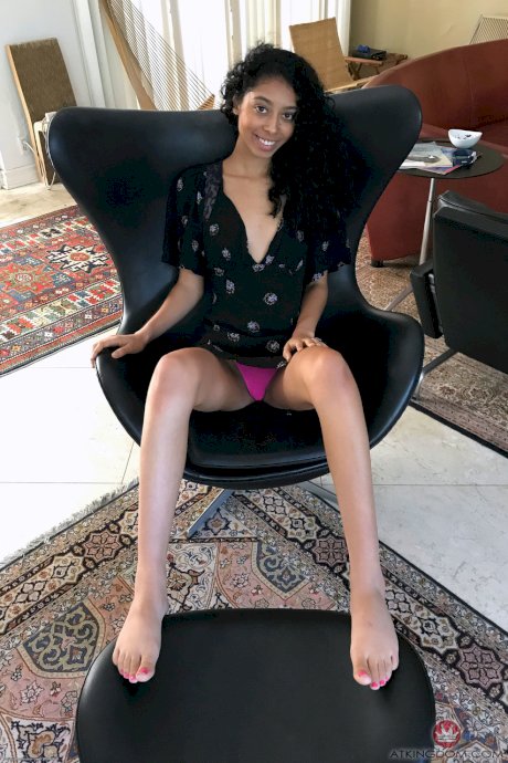 Ebony with tiny tits Jada Doll unveils her slim figure and poses in a solo