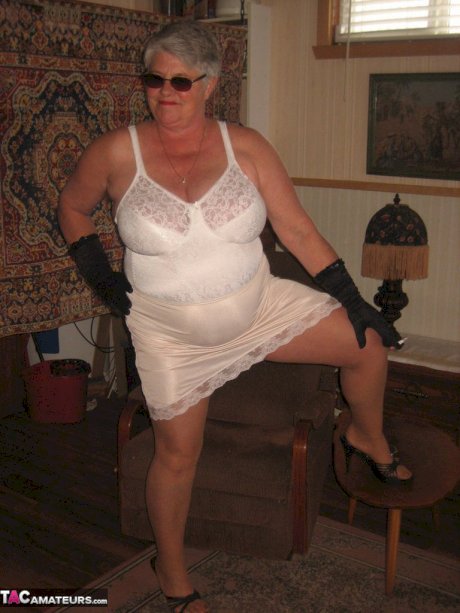 Fat granny Girdle Goddess gets naked in shades, gloves and pantyhose