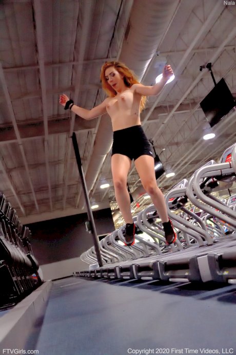 Naughty babe with big boobs Nala works out while naked at the gym