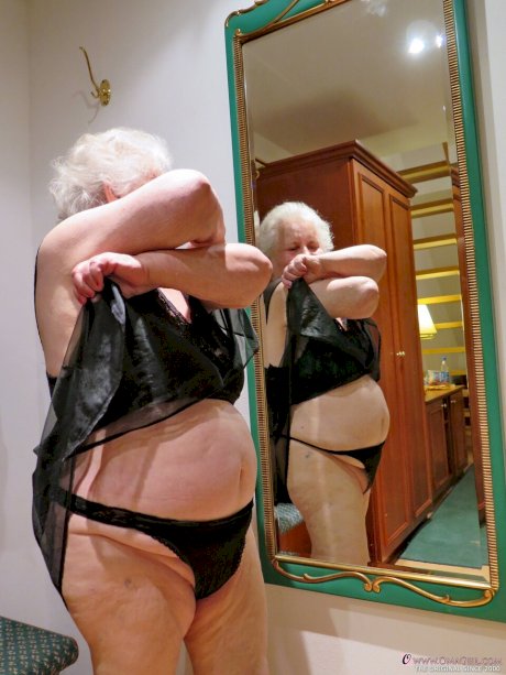Fat old granny Galfira undresses and poses naked in a solo show