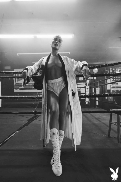 Athletic woman Vendela models semi-nude in boxing attire with a sweat on