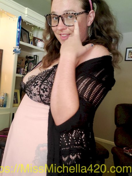 Nerdy amateur in glasses Michella Marijuana teases with her deep cleavage