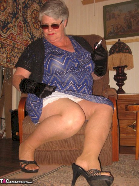 Fat granny Girdle Goddess gets naked in shades, gloves and pantyhose
