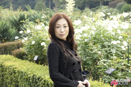 Fully clothed Japanese teen models in the park in black clothes and stockings