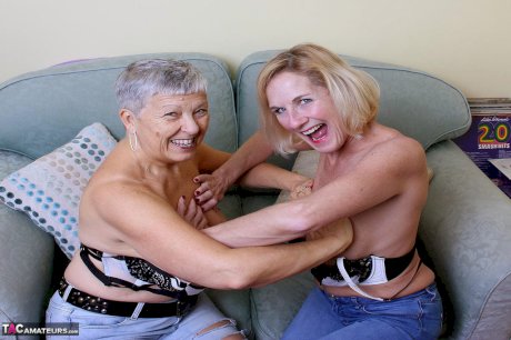 Two old lesbians exposes their big boobs and bare asses together