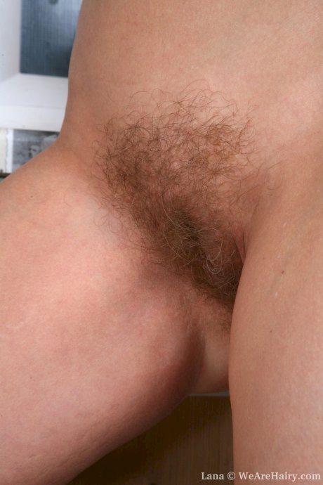 Blonde housewife Lana takes off her clothes and shows her hirsute vagina