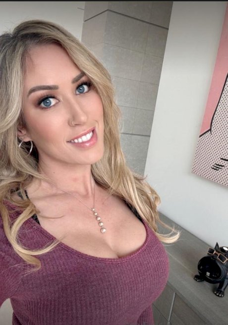 Blonde solo model Capri Cavanni takes self shots during non-nude action