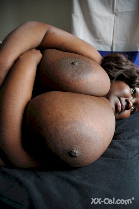 Fat black woman Mariana Kodjo showing off her extra-large natural tits