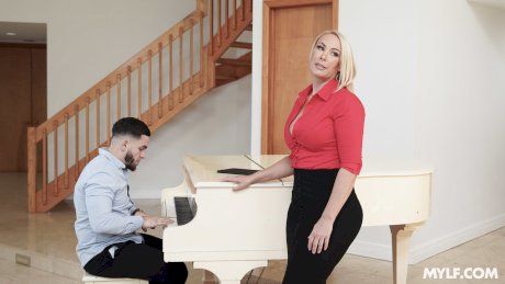 Piano teacher Mellanie Monroe seduces a student with her big tits & fucks him