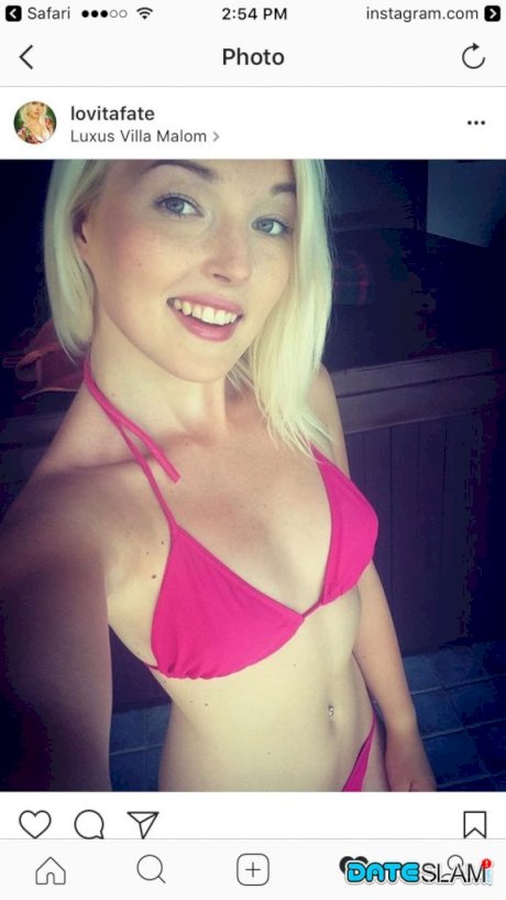 Hot blonde amateur Lovita Fate takes a self shot in hot lingerie & stockings
