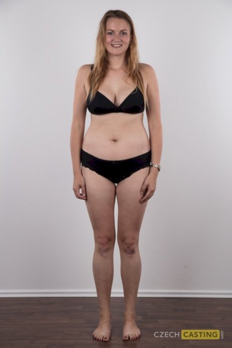 Chubby teen stands fully clothed before doing the same without any clothes on