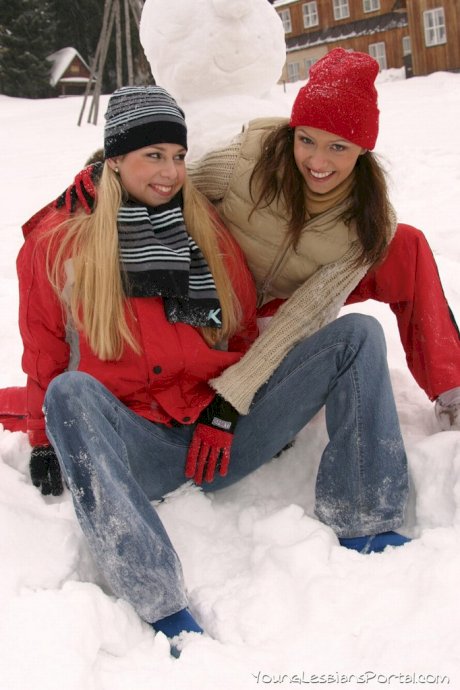 Amateur girls build a snowman before lesbian sex in the snow
