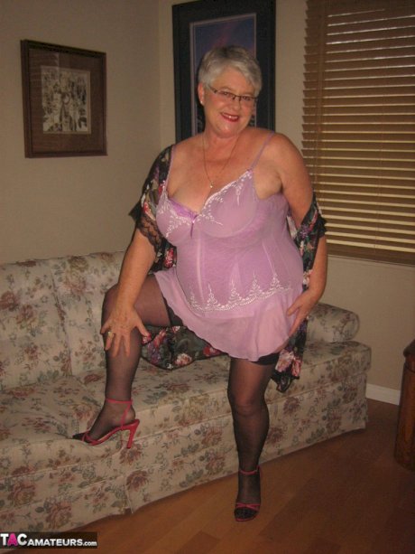 Fat granny Girdle Goddess lets her large boobs loose from lingerie