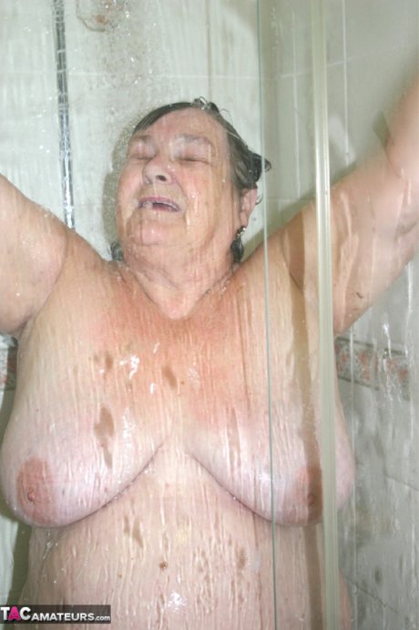 Obese granny Grandma Libby fondles her naked body while taking a shower