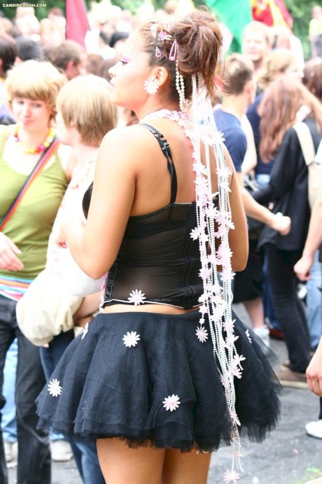 Teen girls at a street party are secretly recorded by a public voyeur