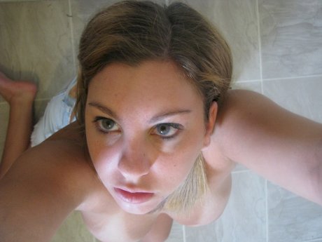 Busty amateur Nikki Morgan shows off her breathtaking big boobs up close