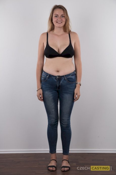 Chubby teen stands fully clothed before doing the same without any clothes on