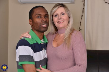Horny mom Velvet Skye gives a young black guy a great fucking lesson