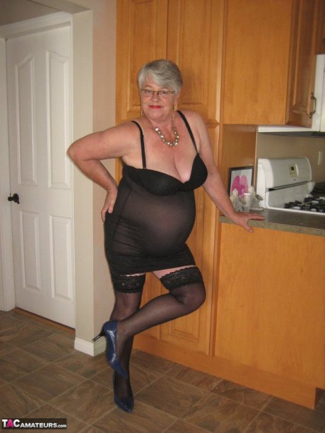 Silver haired nan Girdle Goddess looses her large tits from black lingerie