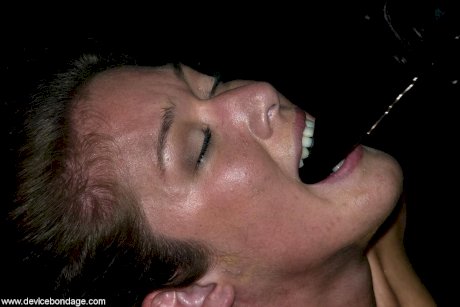 Restrained blonde slaves have her asshole masturbated by a man in dungeon - Photo 16