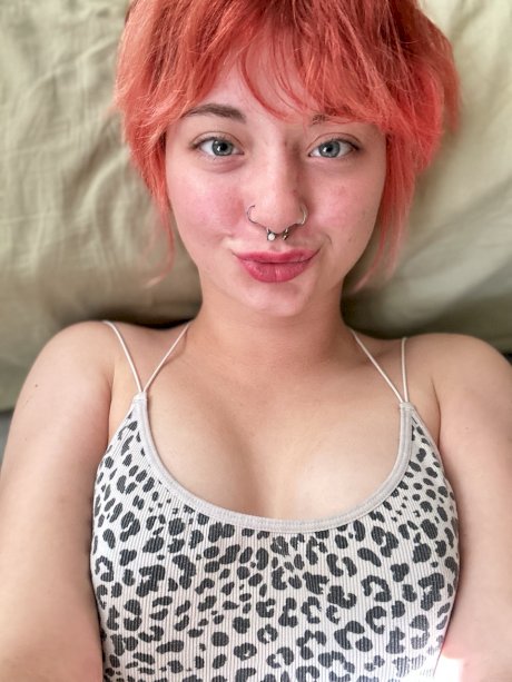 Pink-haired amateur slut Redhead Abby poses dressed up in the mirror