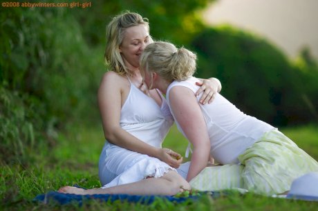 Young blondes Anneke and Sue-Ann make love during outdoor lesbian sex