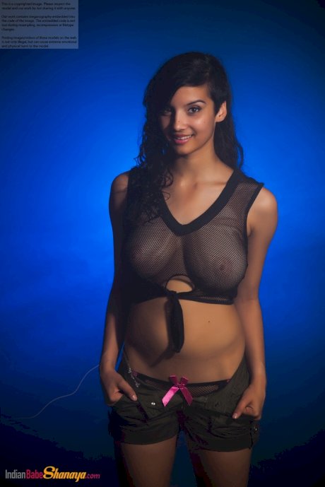 Indian female models non nude in a see thru top and shorts