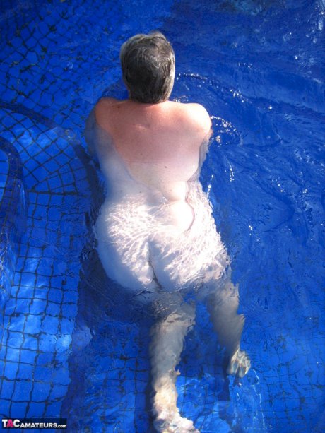 Fat nan Girdle Goddess goes for a skinny dip in a backyard pool