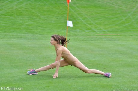 Petite blue-eyed brunette Lana strikes sexy nude poses outdoors